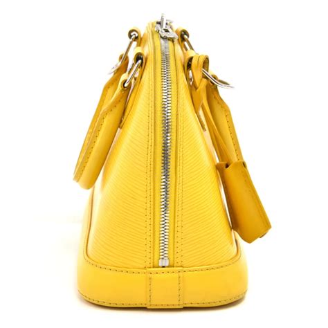 lv alma bb yellow